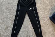 Nike black tracksuit (xs/122-128cm)