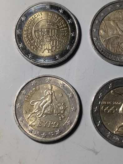 4 x Collectable 2 Euro coins.