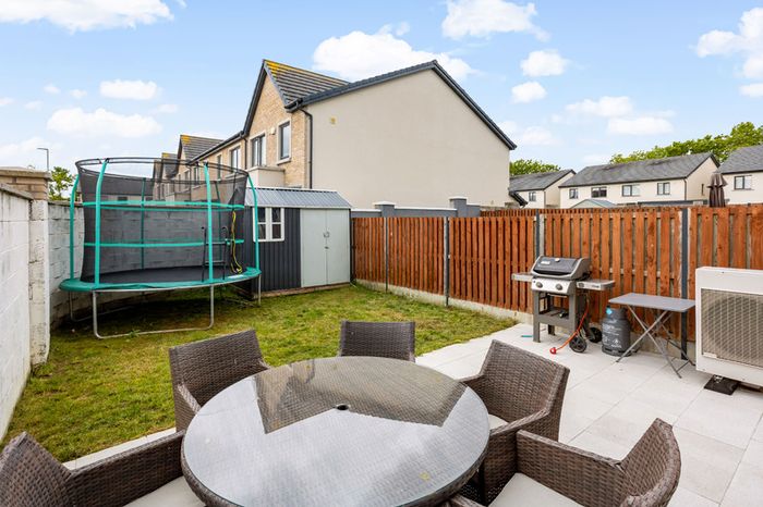 Garden trampoline with safety enclosure