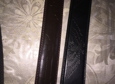 Selecting of men's black/brown belts