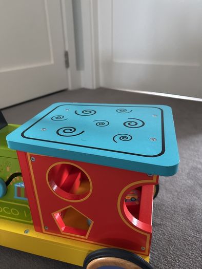 Toy sit on train with activities for toddler