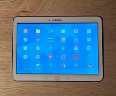 Samsung Galaxy Tablet 4 In Overall Good Condition With Some Mark's On The Screen. Approximately 9" X 7" Comes  With Cable No Plug