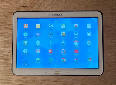Samsung Galaxy Tablet 4 In Overall Good Condition With Some Mark's On The Screen. Approximately 9" X 7" Comes  With Cable No Plug