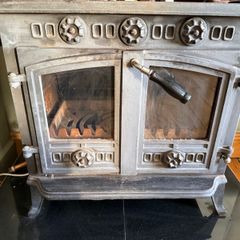 Stove, marble hearth and pump