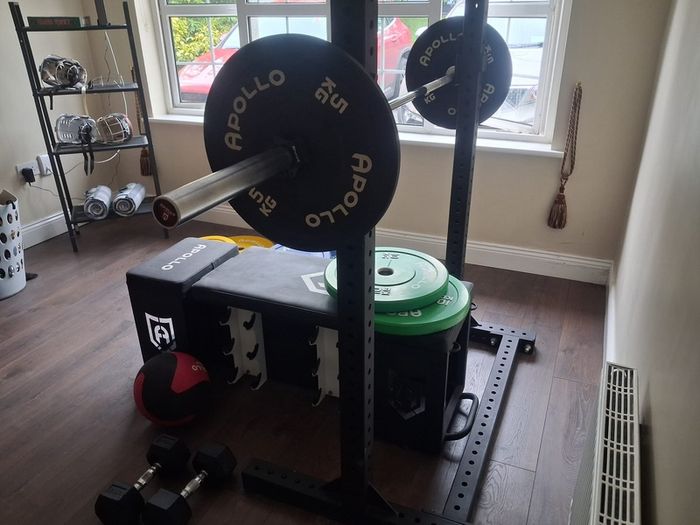 squat rack with weights and adjustable bench