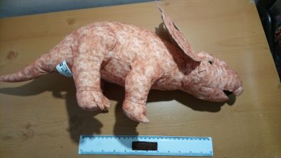 Large roaring dinosaur - teddy triceratops - big lizard - godzilla