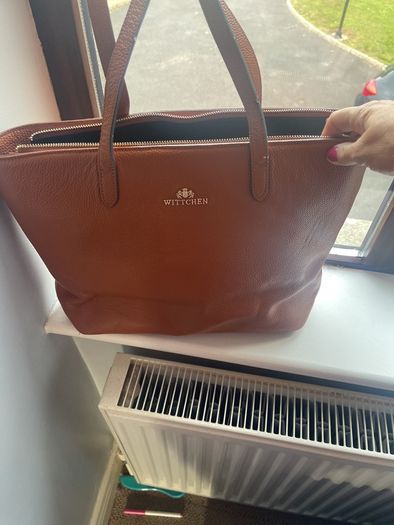 brown leather bag