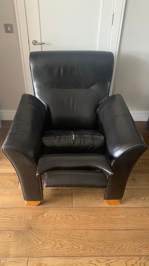 Bespoke solid armchair in need of repair