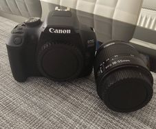 BRAND NEW Canon EOS 2000D with lens and strap