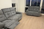 Brand new Montana 3+2 recliner with cup holder