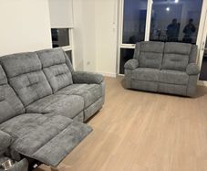 Brand new Montana 3+2 recliner with cup holder