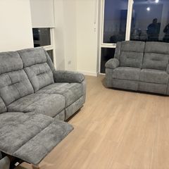 Brand new Montana 3+2 recliner with cup holder