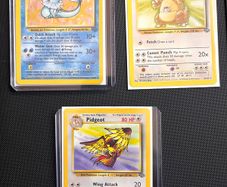 Lot of 21 original vintage Wizards of the Coast (WOTC) English Pokemon TCG cards from the 1999 Jungle and Base Set expansions.