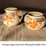 Collection of vintage milk pitchers and matching sugar bowls Image 5