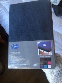 Beauty therapist couch cover with face hole