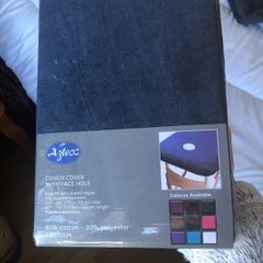 Beauty therapist couch cover with face hole