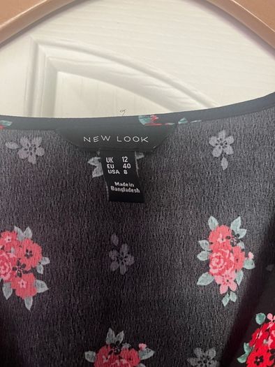 Brand new New look black floral mini dress with long sleeves and frill