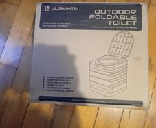 Portable toilet unopened