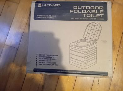 Portable toilet unopened