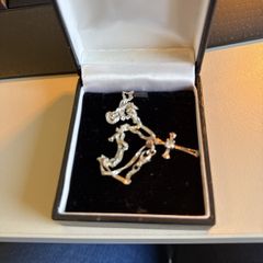 costume jewellery silver chain and cross