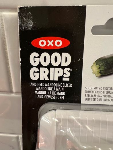 Good Grips - hand-held mandoline slicer