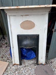 Antique Cast Iron Fireplace Surround with oval inset