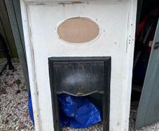 Antique Cast Iron Fireplace Surround with oval inset