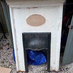 Antique Cast Iron Fireplace Surround with oval inset