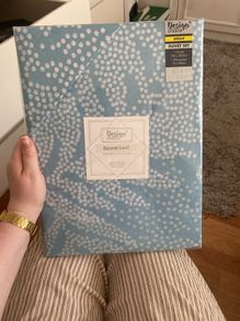 Blue bedroom duvet with white dotted leaves