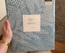 Blue bedroom duvet with white dotted leaves
