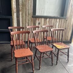 A set of 6 Victorian painted Elm stick back kitchen chairs.