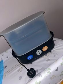Brand New Tommy Tippee steriliser + 2 bottles