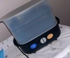 Brand New Tommy Tippee steriliser + 2 bottles