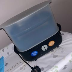 Brand New Tommy Tippee steriliser + 2 bottles