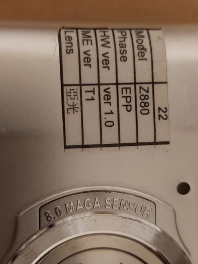 Z880 Digital Camera, Takes 2AA Batteries, working fine, has a modification that doesn't affect its performance