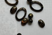 Beads black with gold