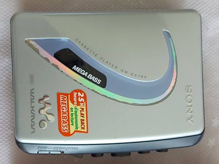 Sony Walkman and Sanyo AM-FM Stereo cassette Player, excellent cosmetic condition, no cables or batteries
