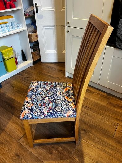 Solid oak dining table & 6 reupholstered dining chairs