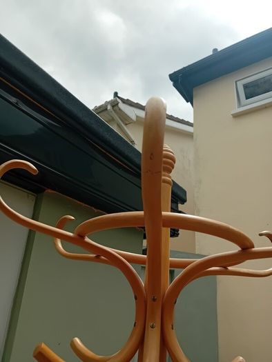 Wooden rotating coat stand
