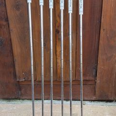 Titleist T100s irons.