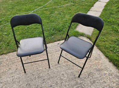 Black foldable chairs