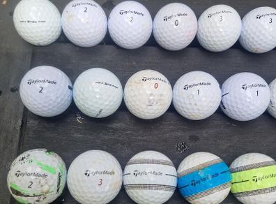 30 pre-used Taylor Made golf balls