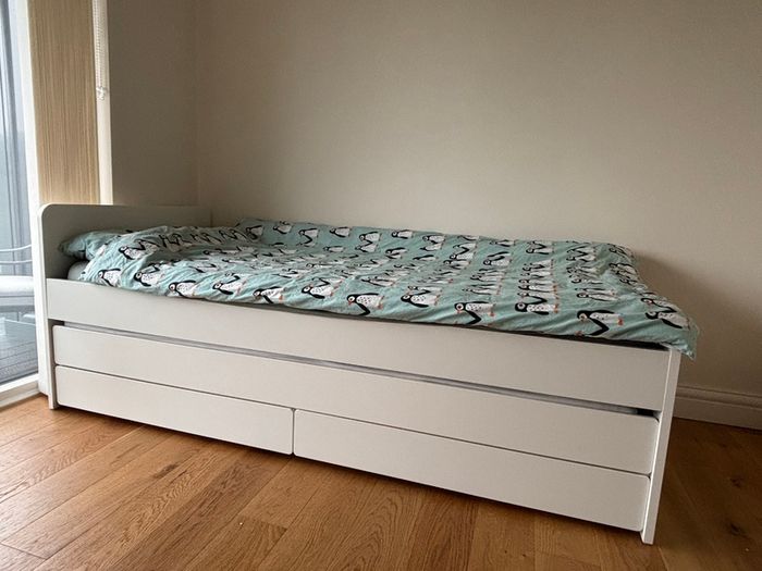 IKEA bed frame with pull-out underbed and storage with Mattresses