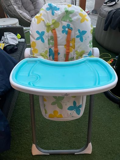 Adjustable reclining high chair