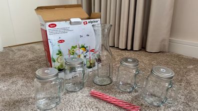 Brand new Glass Carafe/Pitcher/Jug with 4 drinking jars by ALPINA