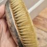 Rough Estimate of 35/40 grams of Antique Silver Brushes and Leather Case Image 10