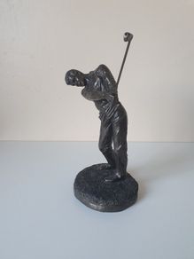 Golfer statue