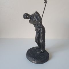 Golfer statue