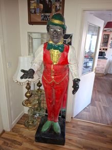 1920s Life-size Antique Sculpture in the form of a Butler, This extraordinary work of art, dating from around 1920, captivates with its impressive size and attention to detail. just Over 6 feet tall.,