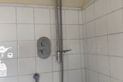 Chrome shower mixer with riser rail and handset